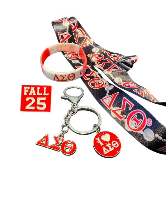 Keychain with 'Delta Sigma Theta' symbols, wristband, and lanyard on a white background